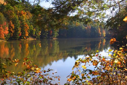 Fall foliage and lake at Watoga State Park in West Virginia.