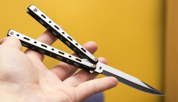 hand-holding-butterfly-knife Everything You'll Ever Need To Know About Butterfly Knives