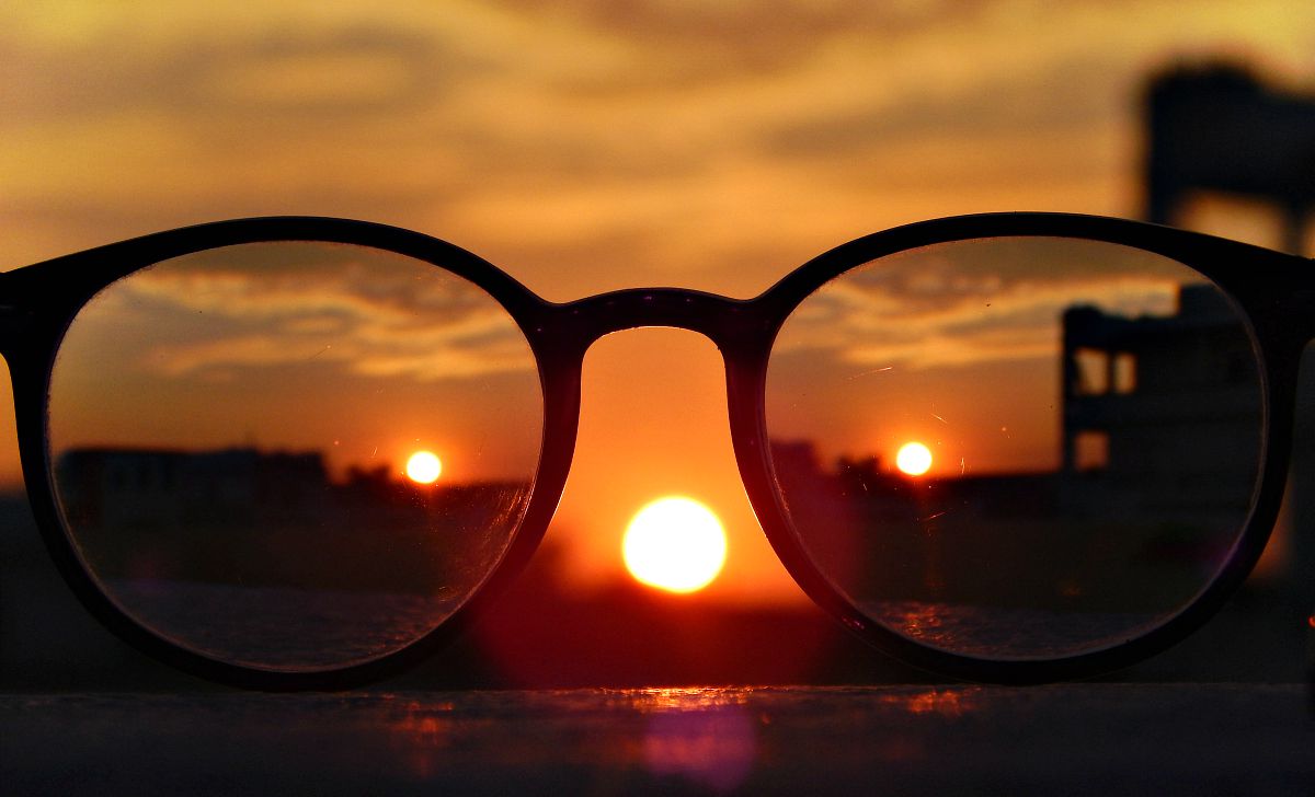 Close-up photography of eyeglasses at golden hour | Keeping Focus For The Focus Challenged