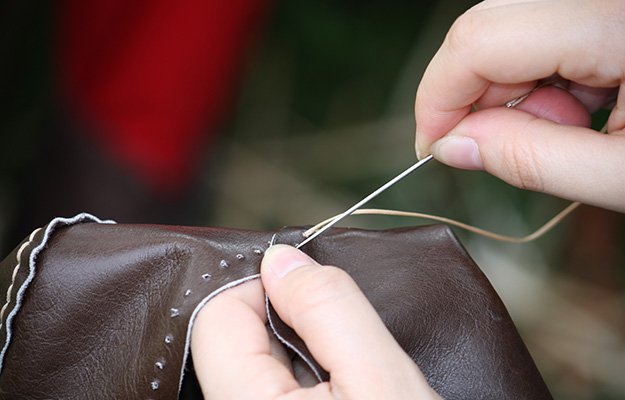 sewing a leather | Homesteading and Sustainability: How To Become Self Reliant | homesteading survival skills