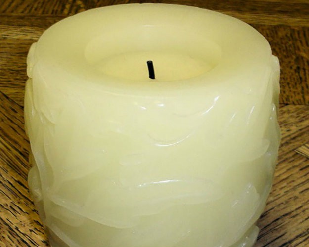 A battery operated flameless candle