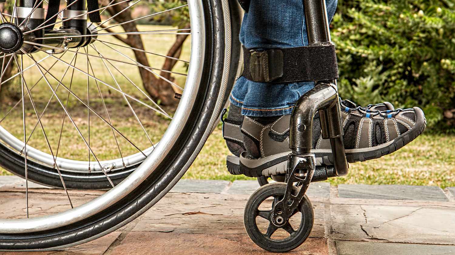 Feature | Handicapped man sitting in a wheelchair | Prepping Tips For The Mobility Challenged