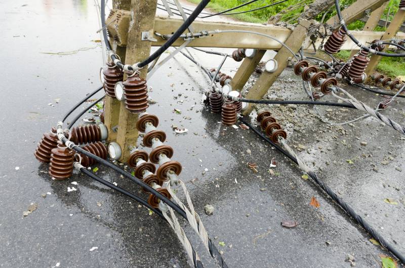 parts-electric-pole-damage-after-storm hurricane survival