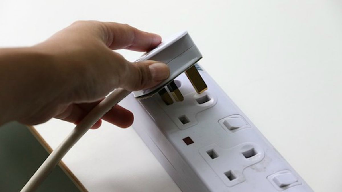 Hands unplug electric socket | Power Outage: What To Do When The Power Goes Out