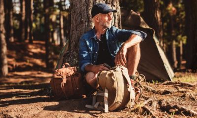 portrait senior man sitting under tree | Wilderness DIY: How to Make Your Own Bushcraft Camp Chair | featured