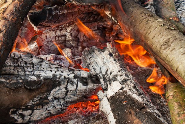 burning-fire-with-large-hot-logs How To Start and Maintain a Fire in a Winter Survival Situation