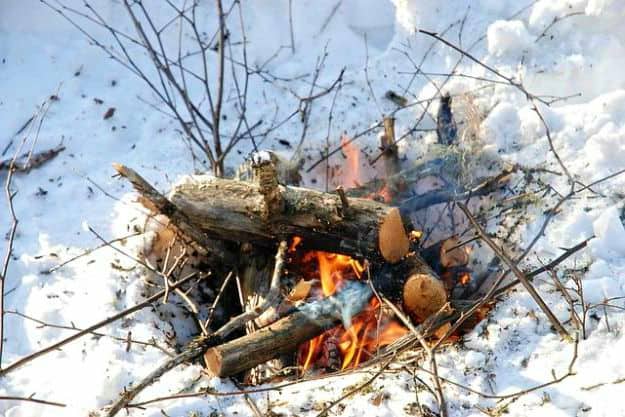 Start a Small Forest Fire | Beyond The Freezing Point | Cold Weather Survival Tips | how to survive in cold weather in the wilderness