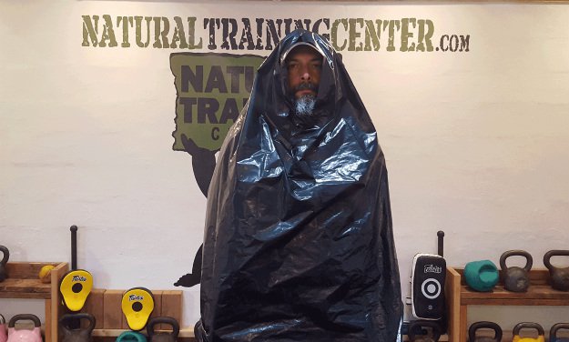 Poncho | Survival Uses For A Contractor's Trash Bag
