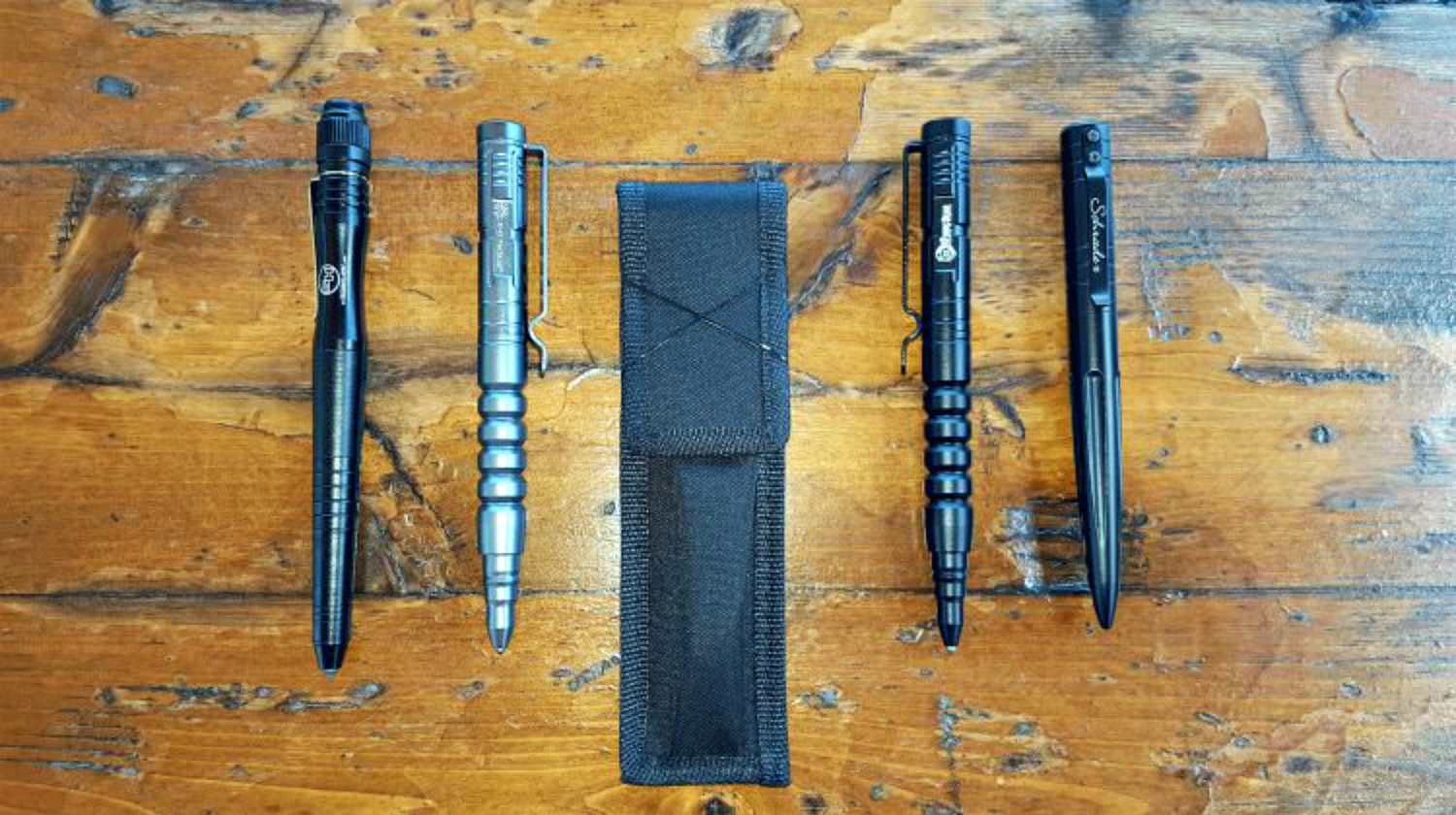 Feature | Different types of tactical pen on wooden table | Tactical Pens: They “Ain't” Just For Writing