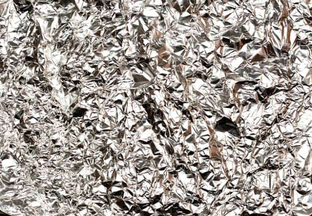 Scrub Dirty Pots And Pans | Uncommon Uses For Aluminum Foil