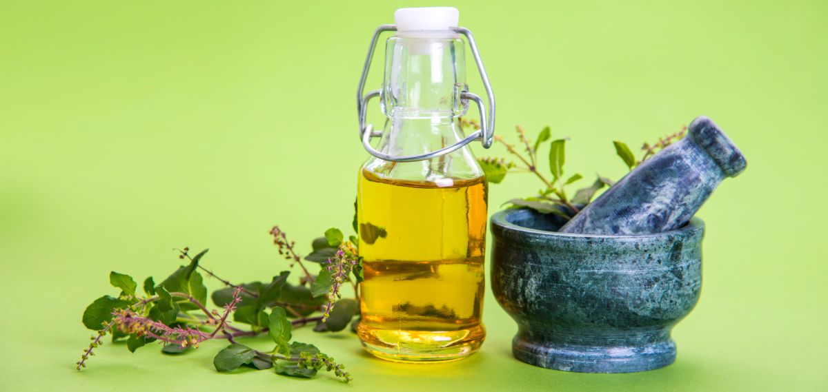 Ayurvedic Tulsi oil in glass bottle | Ayurvedic Remedies for Better Health 