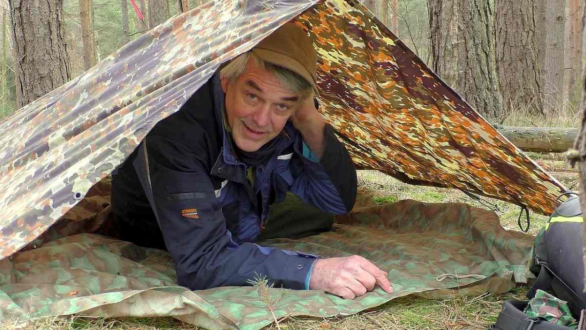 Happy man inside tent | The Survival Rule of Threes