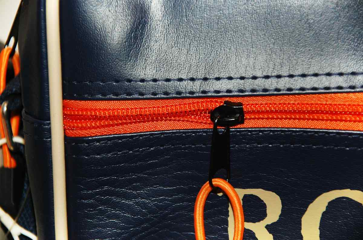 Leather bag orange zipper | Uses for Paracord That Will Surprise You
