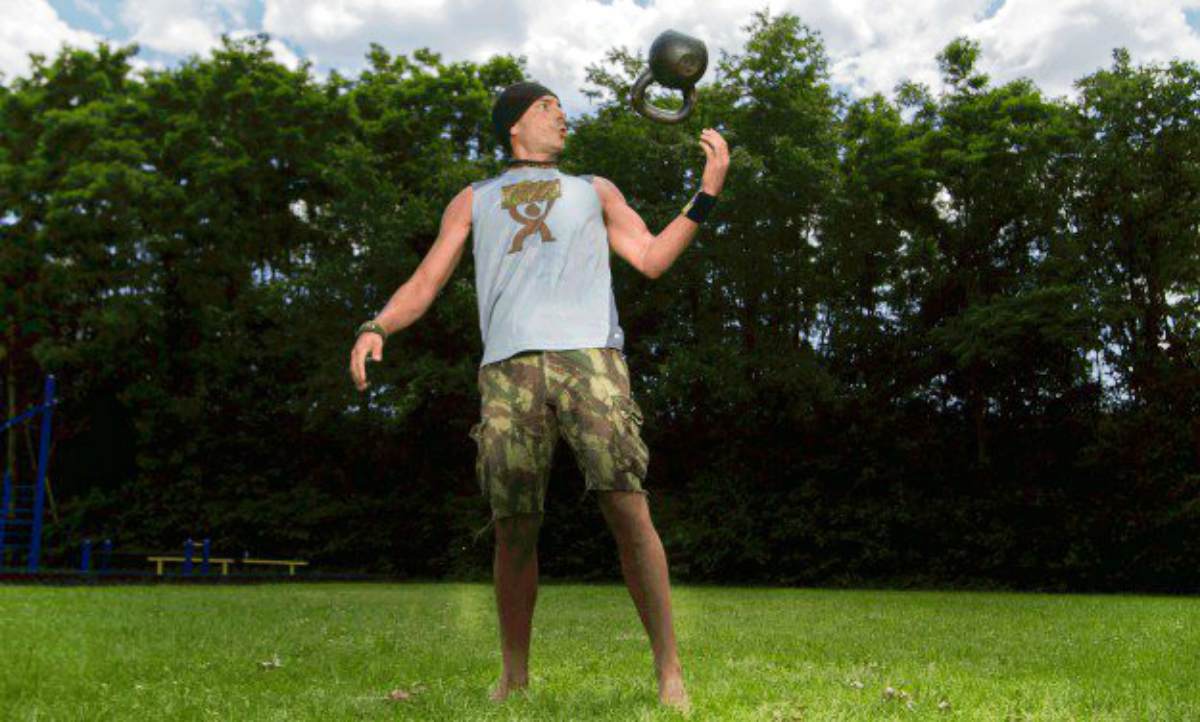Man kettlebell workout in the park | Why The Kettlebell Is The Ultimate Tool For Physical Preparedness