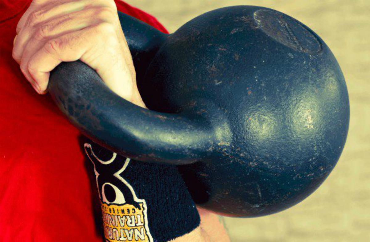 Man holding kettlebell | Why The Kettlebell Is The Ultimate Tool For Physical Preparedness