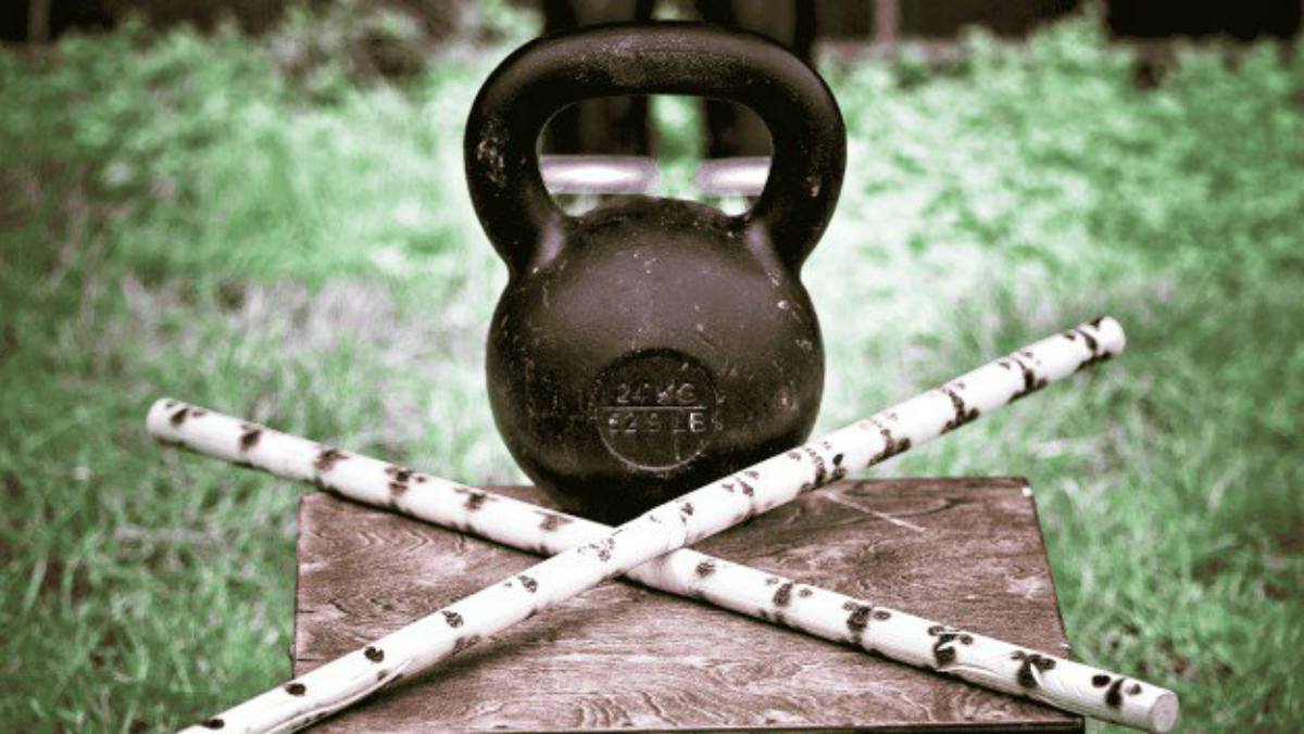 Kettlebell and two sticks | Why The Kettlebell Is The Ultimate Tool For Physical Preparedness