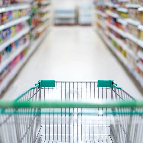 blurred effect supermarket aisle empty silver dollar tree prepper items | featured
