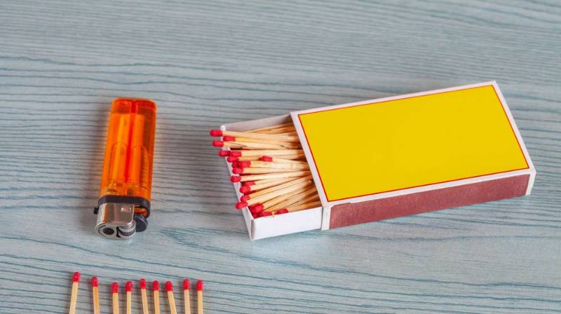 matchstick lighters on color wood table Dollar Tree prepper items 