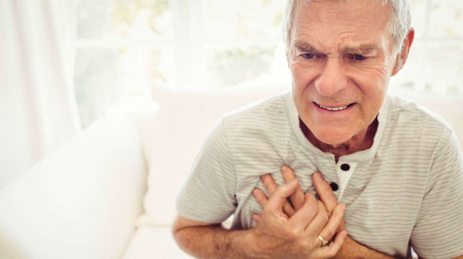 Feature | Old man holding his chest having heart attack | Heart Attack Signs You Should Know To Survive When You Are Alone