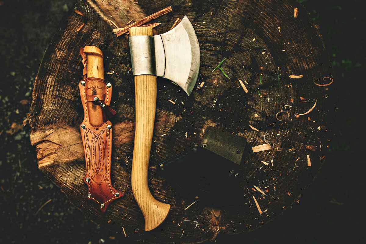 Knife and axe in the woods | How To Build An Overnight Bushcraft Camp