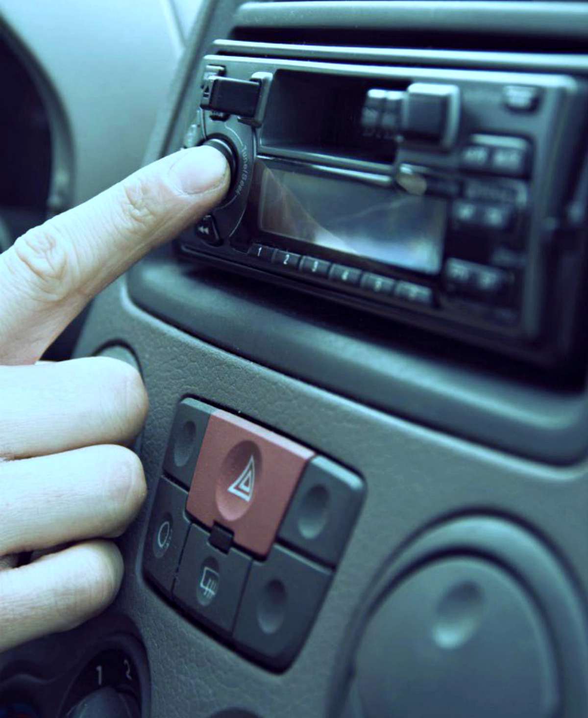 Pressing play button car radio | Tips For Sheltering In Place