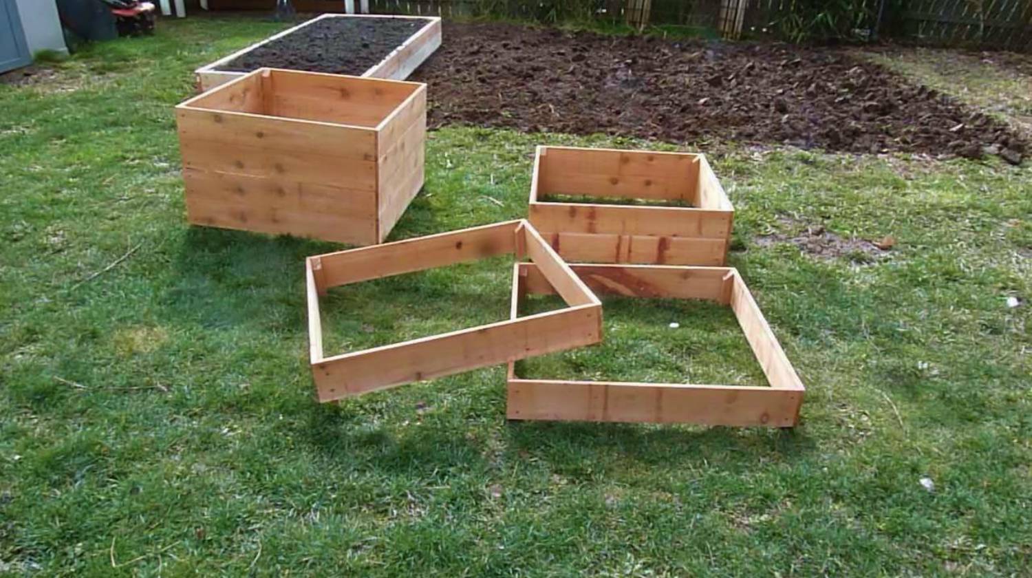 plant boxes on a garden | garden design | Grow 100 Pounds Of Potatoes In A DIY Square Garden Design | Grow 100 Pounds of Potatoes | how to grow potatoes | Featured