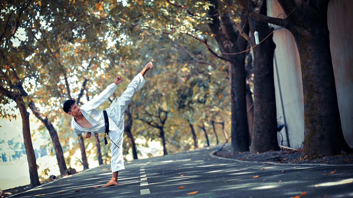 Featured | A man doing standing on road | Self-Defense Martial Arts For Personal Safety And Survival