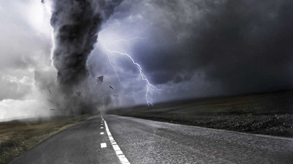 powerful-tornado-destroying-property-lightning-background natural disasters | Featured