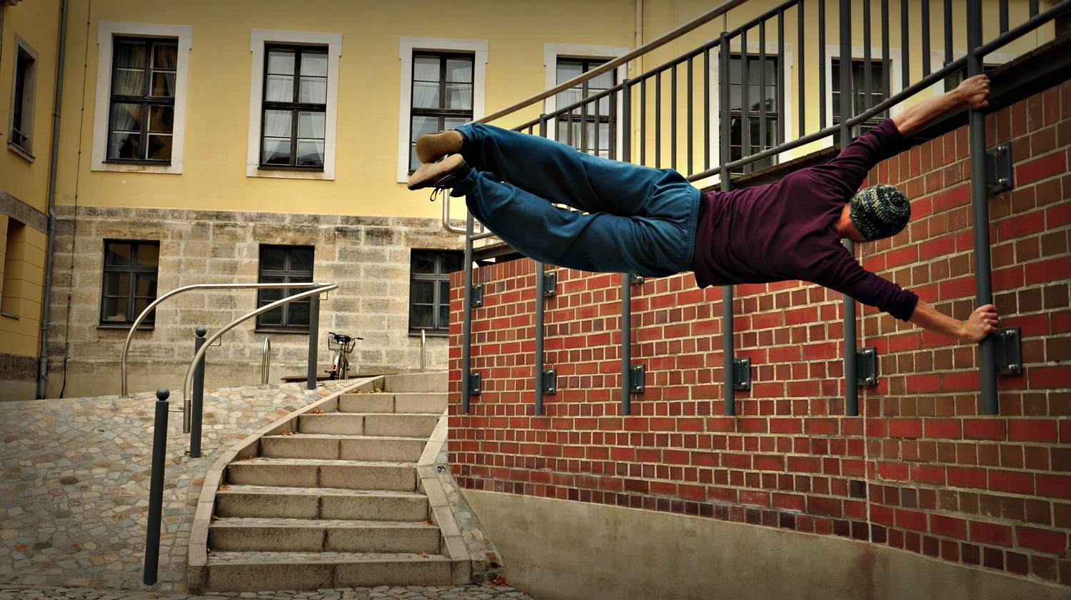 Acrobatics-action-adult | Is Parkour Training A Survival Skill Or Just A Fad Exercise? | Featured