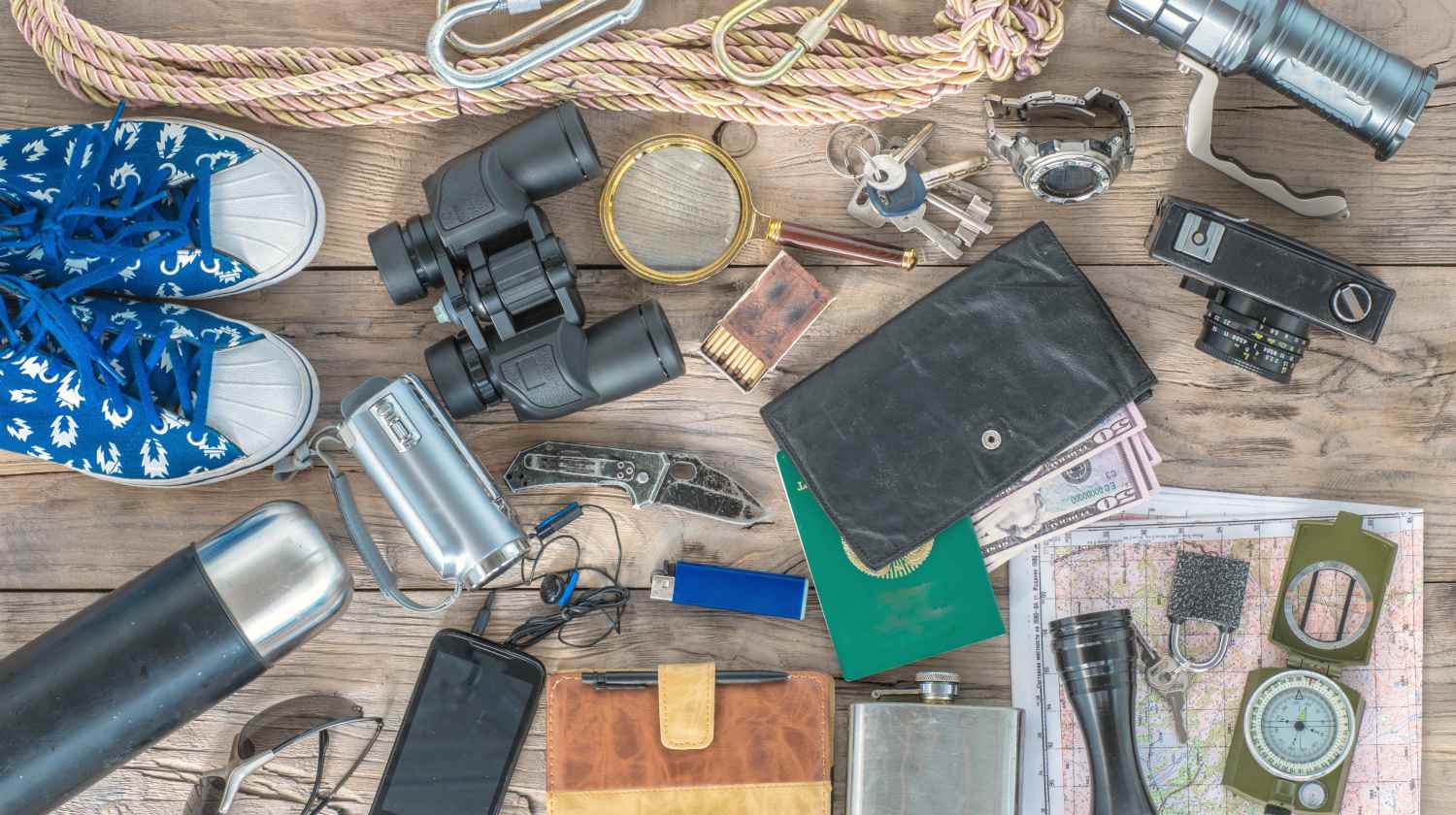 scout kit on wooden background | How To Build An Urban Survival Kit | how to build an urban survival kit | urban survival essentials | Featured