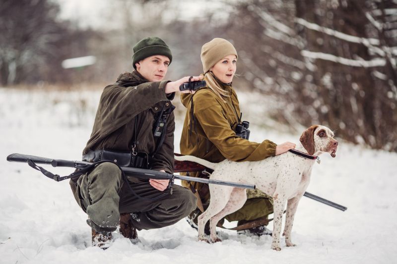 two hunters rifles snowy winter forest | Include Pets in the Planning | Couples Defense