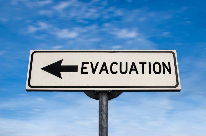 evacuation-road-sign-arrow-on-blue flood survival 