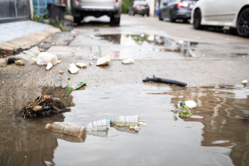 garbage-dirty-water-rubbish-scattered-all flood survival tips