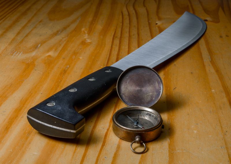 machete-compass-wood-background machete knife 
