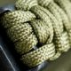 closeup braided green paracord bracelet handmade | How To Make A Paracord Belt To Stay Prepared [Video] | featured