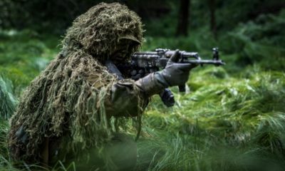 camouflaged commando assault forest soldier dressed | How To Make A Ghillie Suit From Scratch | featured