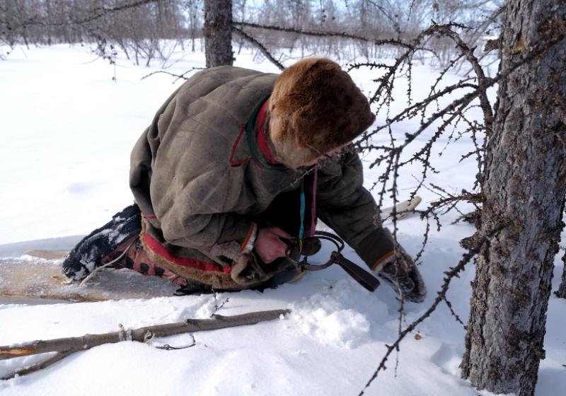 ethnography ski hunter sets trap wild | winter survival gear list