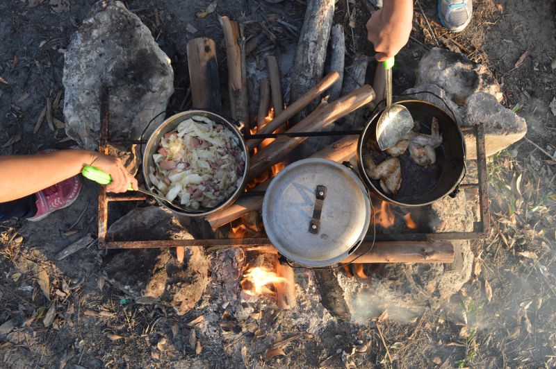 cooking-dinner-on-firewood-stove-using | survival food