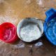blue white red plastic buckets filled | primary drinking water standards