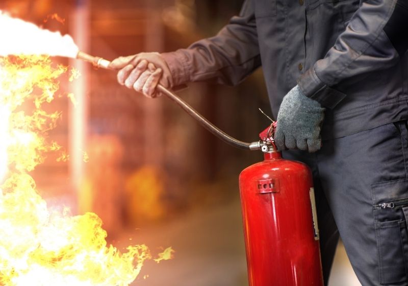 Man using fire extinguisher Blacksmithing guide SS