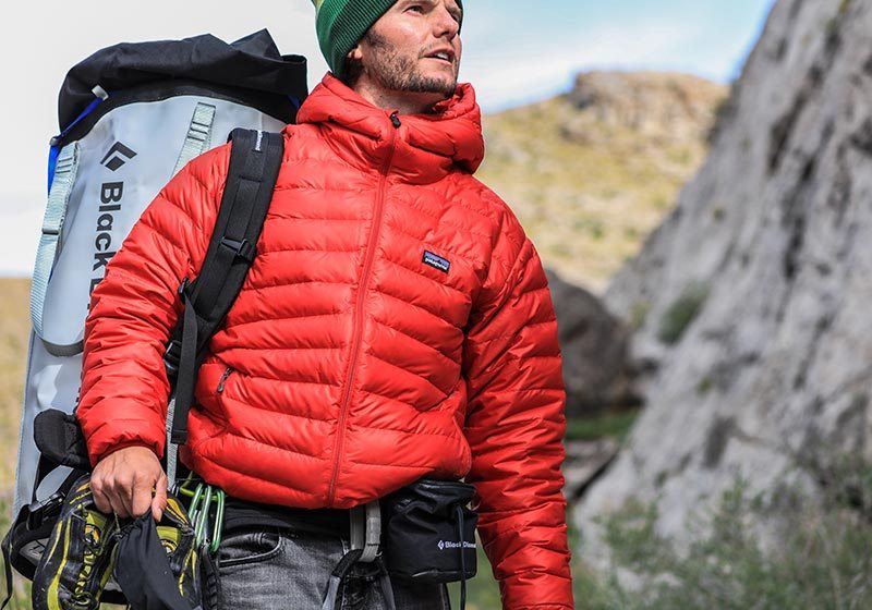 man in camping clothes | ultralight backpacking checklist 