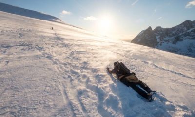 Snowy hill in blizzard at sunset | Winter First Aid Guide | Surviving The Cold Weather | Featured