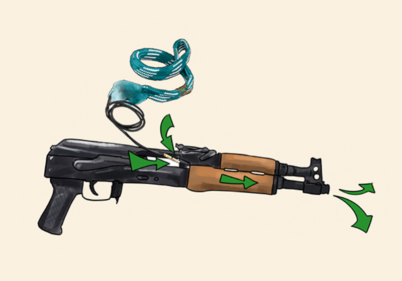 feeding brass weight in gun | bore snake | orig