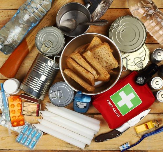 Items of emergency on wooden table-food kit-ss