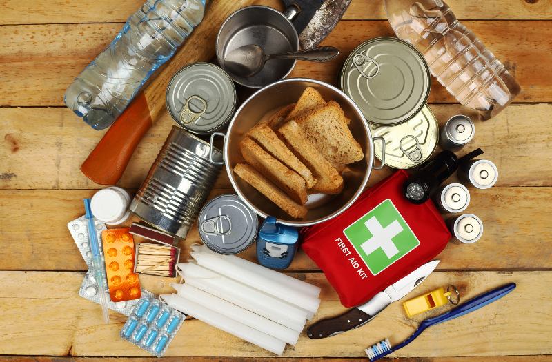 Items of emergency on wooden table-food kit-ss