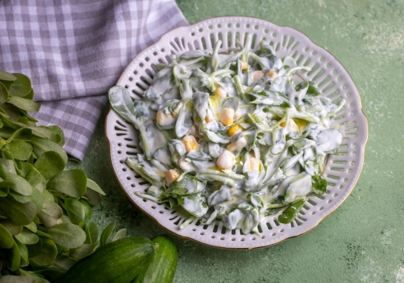 | Purslane salad with yogurt in bowl Purslane edible