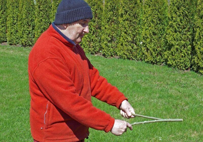 Senior man search divining with the rod | 3 Great Ways To Use Dowsing Rods