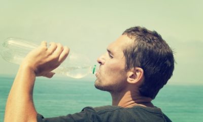 Man drinking water hot day | How To Make Seawater Drinkable Using Plastic Bottle | Featured