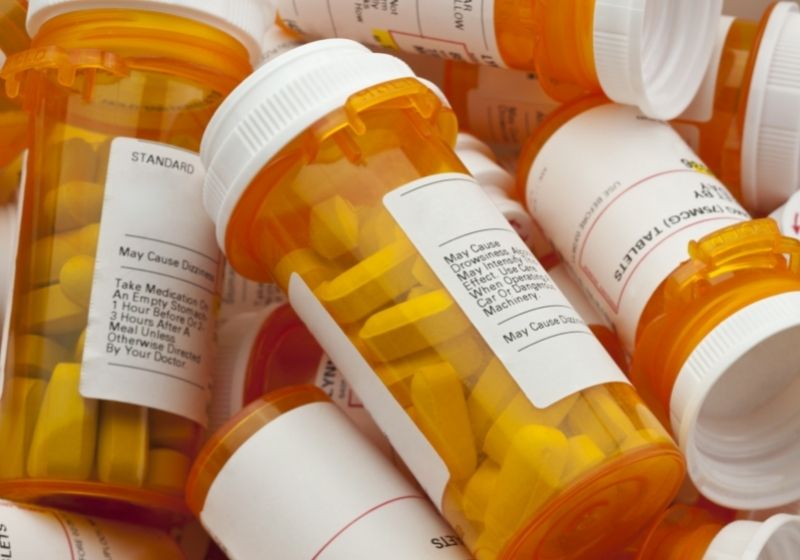 Bottles of prescription medicine in a pile Storm safety kit SS