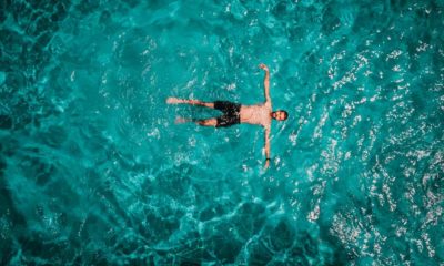 Drone areal view of young male in swimming pool floating | Why Floating Is Better Than Swimming? | Sea Survival | featured